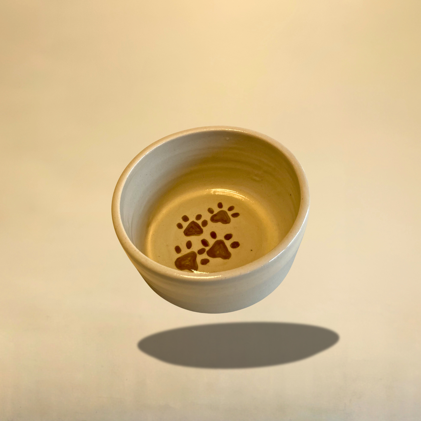 Gamelle en céramique artisanale motif pattes